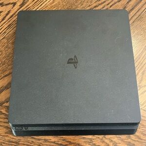 PlayStation 4 Console Used model CUH-2215B great condition. Plus 2 controllers.